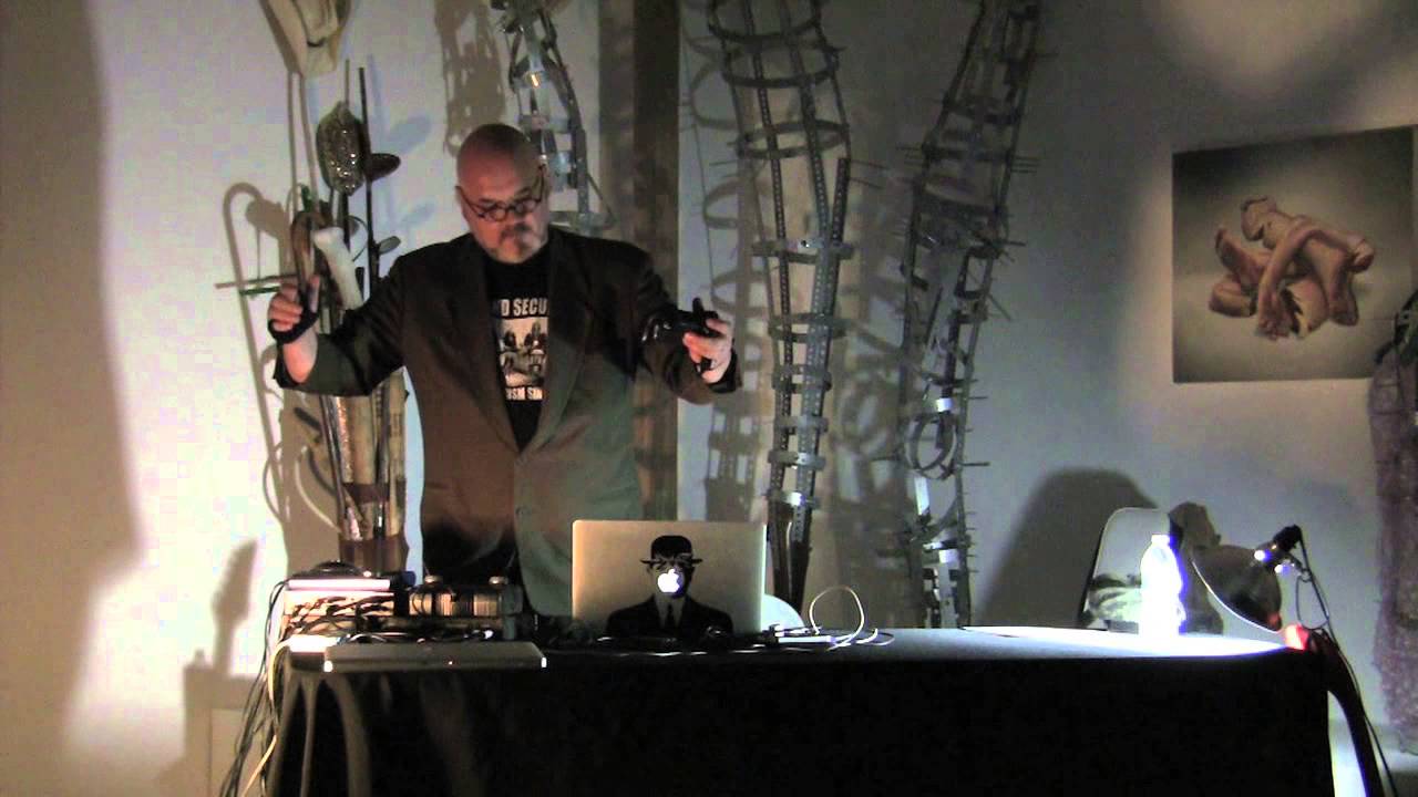 Sound artist and electronic musician Scot Gresham-Lancaster interacting with modular synthesizers and audio gear.