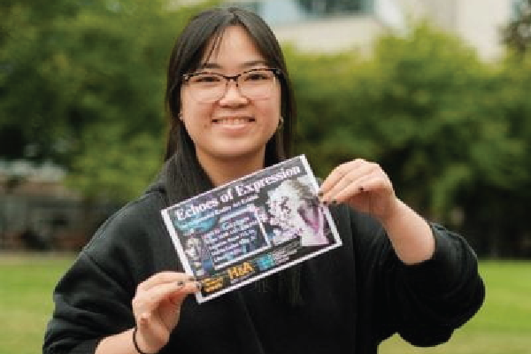 Phuong Trang Maria Vu with postcard