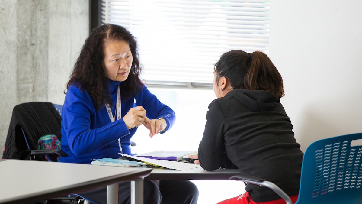 SJSU student receiving guidance from a counselor