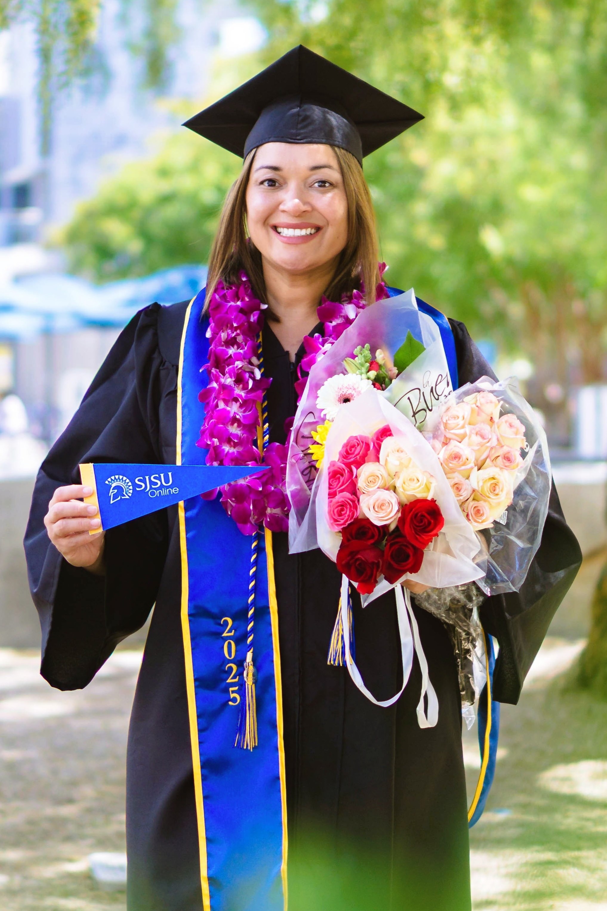 SJSU Online graduate smiling