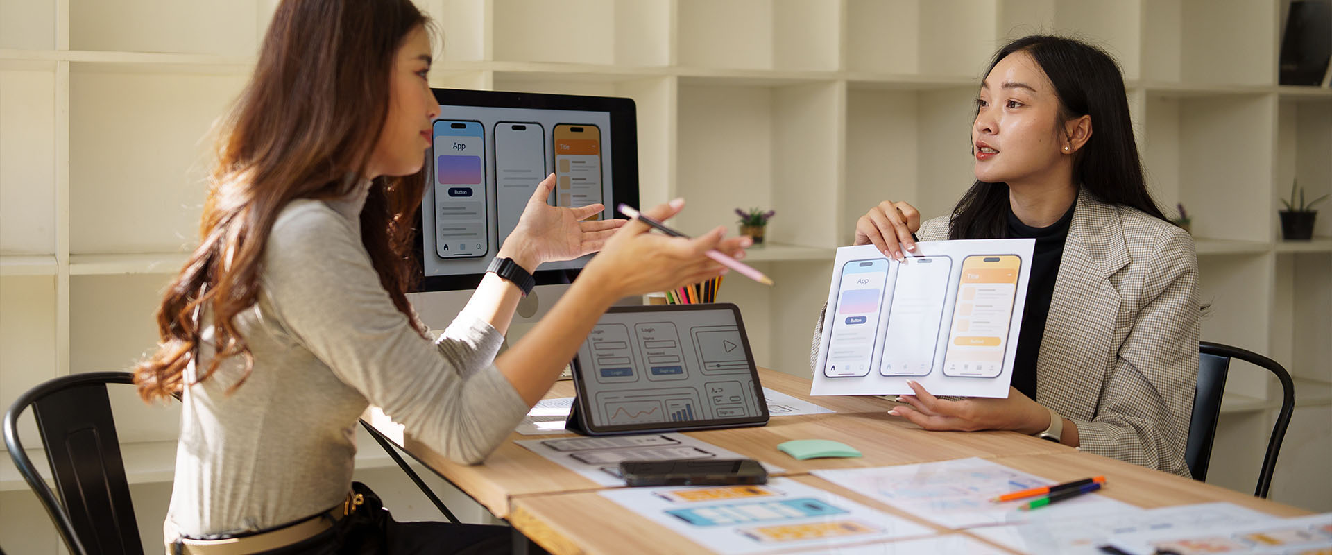 Female UX designers collaborating